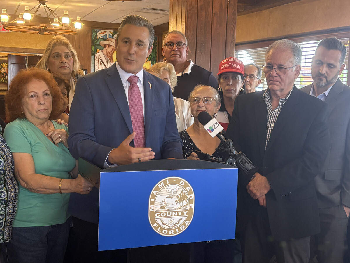 Miami-Dade County Commissioner René Garcia gathers with Little Havana Activities and Nutrition Centers President Rafael Iglesias, and Hialeah seniors on Sept. 16 to announce the nonprofit’s return to Hialeah after Mayor Bryan Calvo ended its longtime operation at Goodlet Park.
